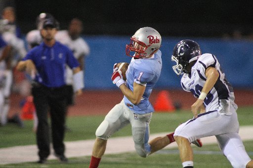 #1 AJ Rosenburg of Southside gets outside the Conway defense for a first down.