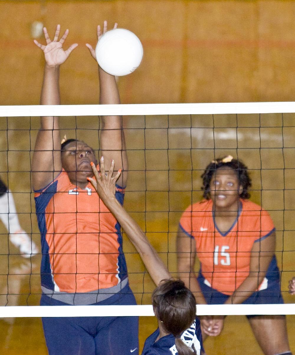 Arkansas Democrat-Gazette/KAREN E. SEGRAVE
9/6/11

Little Rock Hall's Ashtone (cq) Dixon leaps to block the shot from Parkview's Brianna Swinton during their match on Tuesday evening.  Hall defeated Parkview 3-1.
