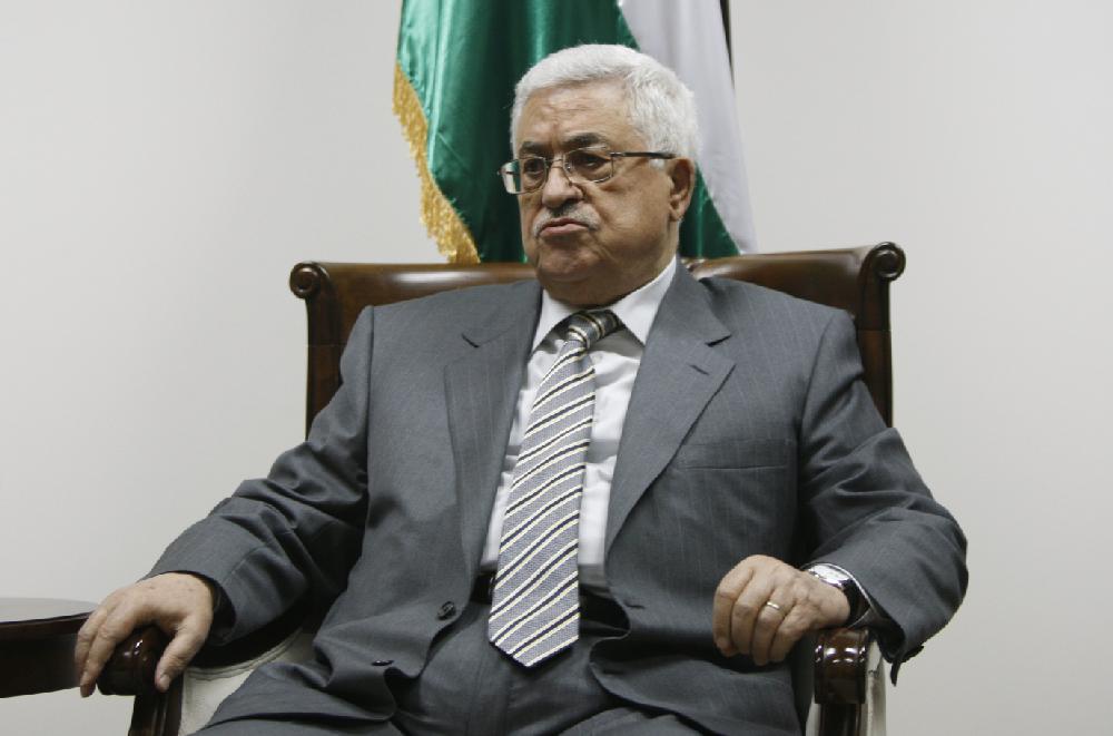 Palestinian President Mahmoud Abbas pauses during a meeting with Palestinian doctors at his office in the West Bank city of Ramallah, Tuesday, Sept. 6, 2011. A delegation of 40 Palestinian medics met with Abbas on Tuesday before leaving on an aid mission to Libya. (AP Photo/Majdi Mohammed)
