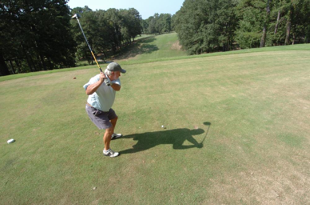 Arkansas Democrat-Gazette/STEVE KEESEE 9/2/11 Travis Nelson, of Benton, tees off on the first hole Friday at Little Rock's  Hindman Golf Course.