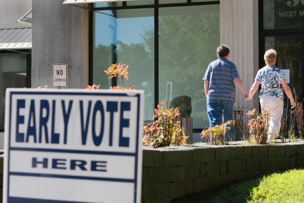 Arkansas Democrat-Gazette/RICK MCFARLAND--09/06/11-- James and Barbara Ford arrive Tuesday at the Pulaski County Regional Building, 501 W. Markham St., in Little Rock, to early vote in the special election concerning a sales tax increase. The election will be next Tuesday.