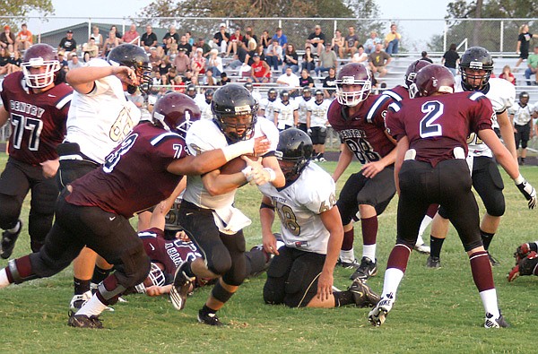 Gentry senior Ricky Hernandez puts an end to a West Fork run attempt during a scrimmage in Gentry on Aug. 23.