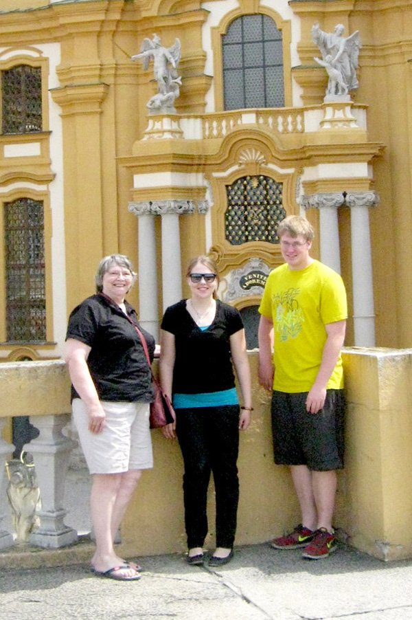 Magdalena Riedler center with Karen Kerr and her grandson, Jeremy McGarrah in front of a castle of the Hapsburg family in Vienna.
