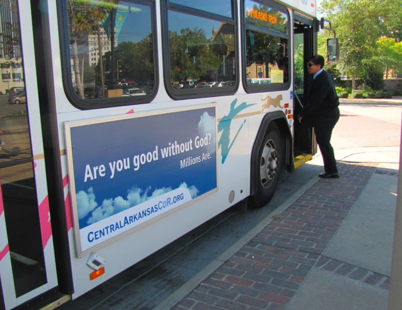 An ad from the Central Arkansas Coalition of Reason adorns a Central Arkansas Transit Authority bus.