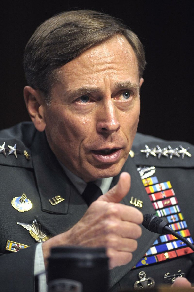 FILE: CIA Director Gen. David Petraeus testifies on Capitol Hill in Washington, Thursday, June 23, 2011, before the Senate Intelligence Committee during a hearing on his nomination.  (AP Photo/Cliff Owen)