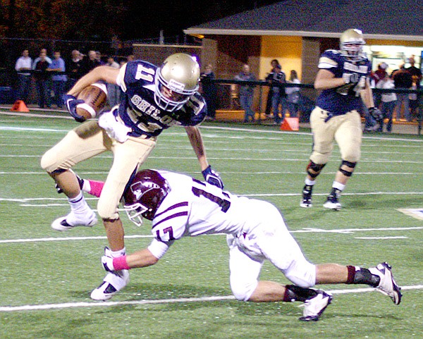 Gentry senior Jordan Cousins puts an end to a run by Shiloh Christian Friday night in Springdale.
