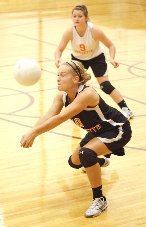 Gravette senior Shyanne Nichols digs to set up the ball during play against Gentry on Thursday at Gentry.

