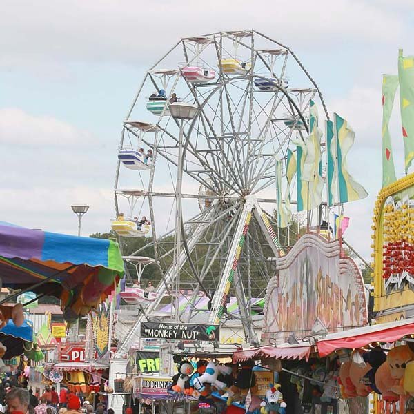 Fairgoers take in the midway at the Arkansas State Fair in Little Rock last October. The fair is expected to decide Thursday whether it will relocate or stay at its current location.
