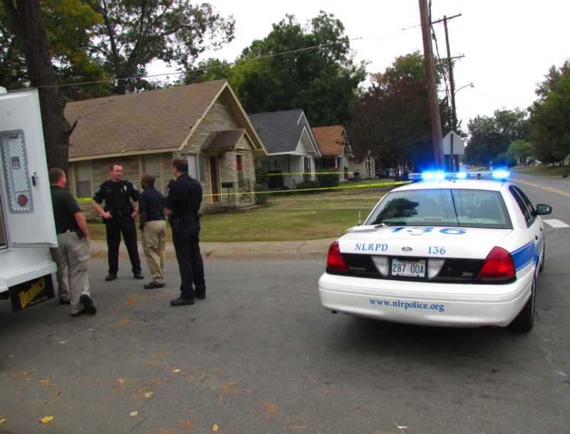 Police remain at 1900 W. 16th St. in North Little Rock hours after a homicide there Wednesday morning.