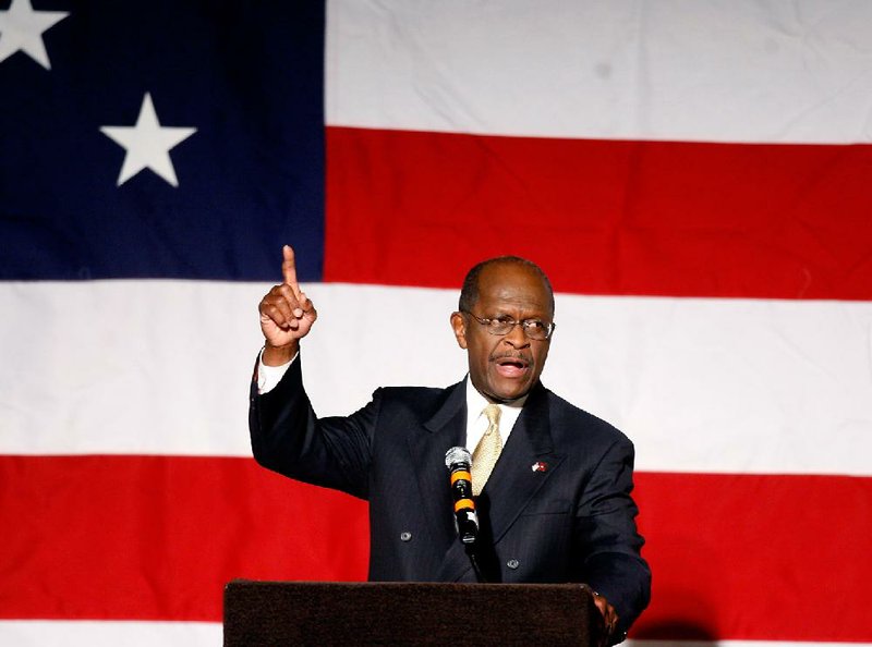 Arkansas Democrat-Gazette/JASON IVESTER --10/27/11--
Republican presidential candidate Herman Cain speaks during the Washington County Republican Party Lincoln Day Dinner inside the Northwest Arkansas Convention Center in Springdale on Thursday, Oct. 27, 2011.