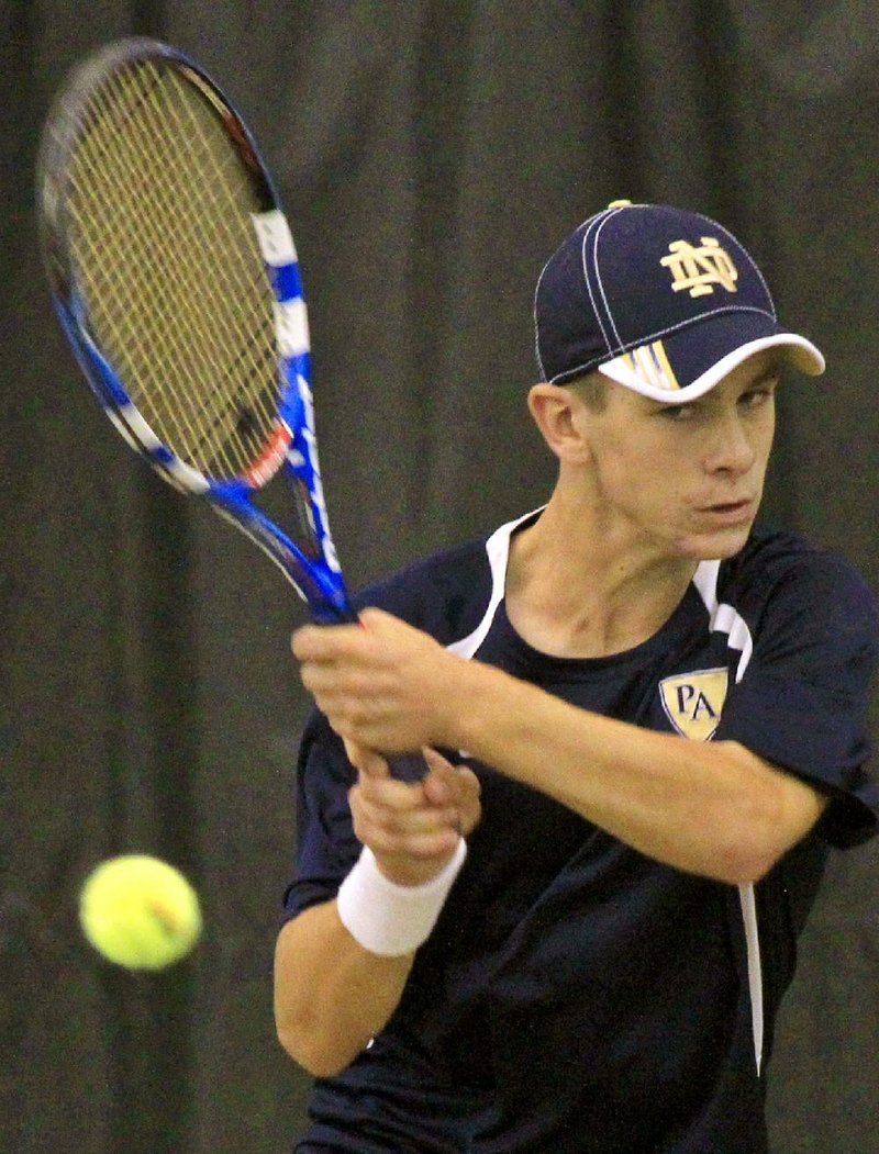 Jake Jacoby of Pulaski Academy defeated White Hall’s Cole Guy 6-3, 6-4 during the boys final at the Overall State Tennis Tournament on Thursday at the Burns Park indoor tennis complex in North Little Rock. 