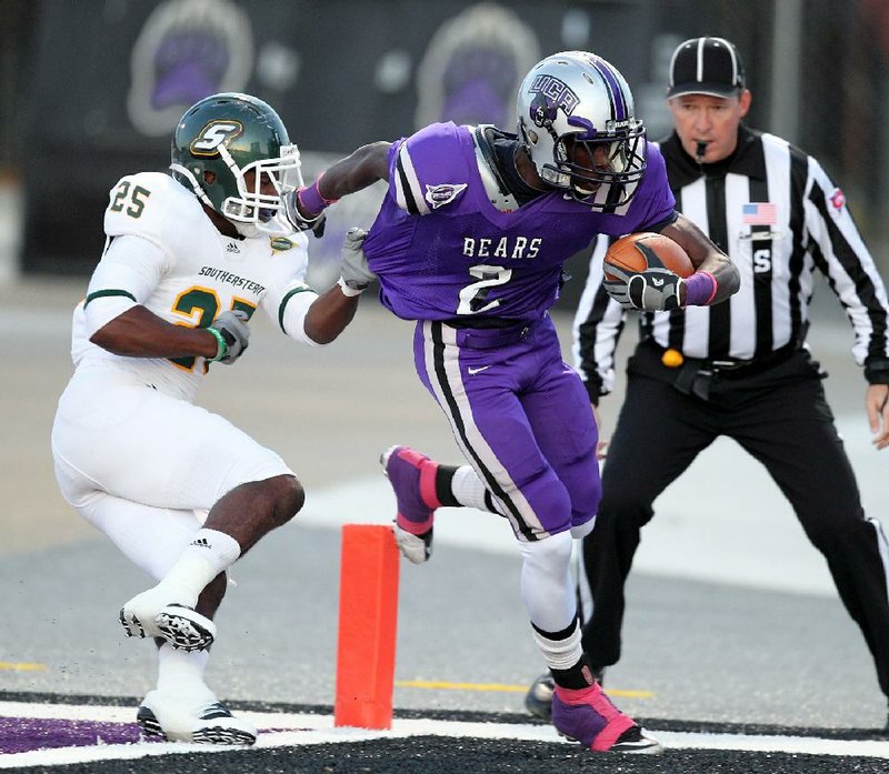Central Arkansas wide receiver Jesse Grandy (2) scores on a 44-yard touchdown pass in front of Southeastern Louisiana defender Keiron Jones. Grandy finished with 4 catches for 93 yards. 