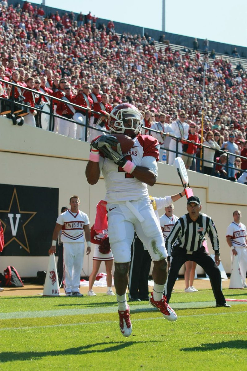 Arkansas’ Jarius Wright catches a touchdown pass in the 2nd quarter of the Razorbacks’ 31-28 victory Saturday against Vanderbilt. Wright caught 10 passes for 135 yards and 1 touchdown. 