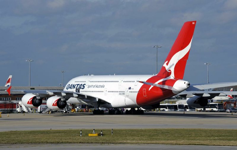 A Qantas Airbus A380 sit on the tarmac at Heathrow Airport, London Saturday Oct. 29, 2011 after Qantas Airways grounded its global fleet indefinitely after weeks of disruptive strikes. Flights in the air continued to their destinations, but others were stopped even taxiing on the runway, according to one flier. Booked passengers were being rescheduled at Qantas' expense, chief executive Alan Joyce said. The Australian government was seeking emergency arbitration to end the strikes. Qantas is the world's 10th largest airline and among the most profitable.   (AP Photo)  UK OUT, NO MAGAZINES, NO SALES