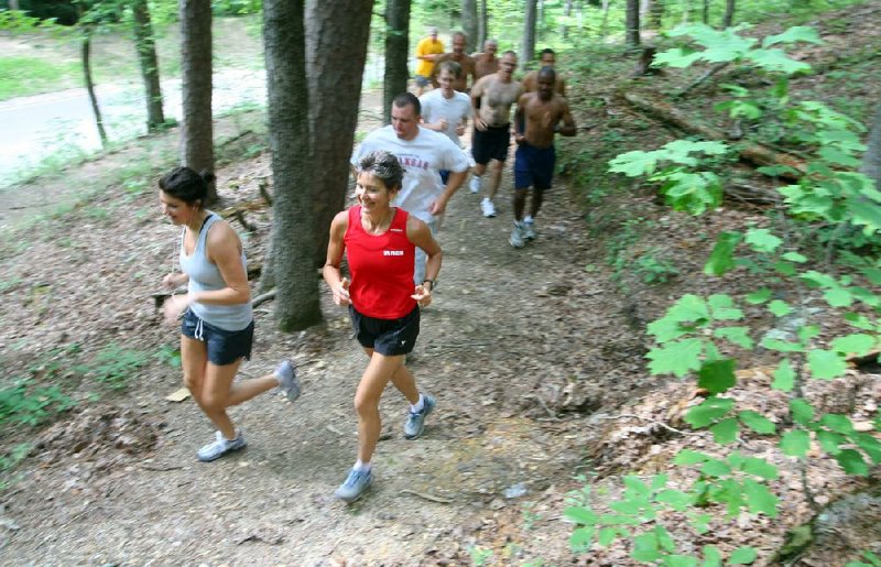 The Spa Pacers running club conducts weekly fun runs on hilly trails through Hot Springs National Park.The Arkansas Governor’s Council on Fitness recently gave the club one of its annual awards for promoting health and wellness. 