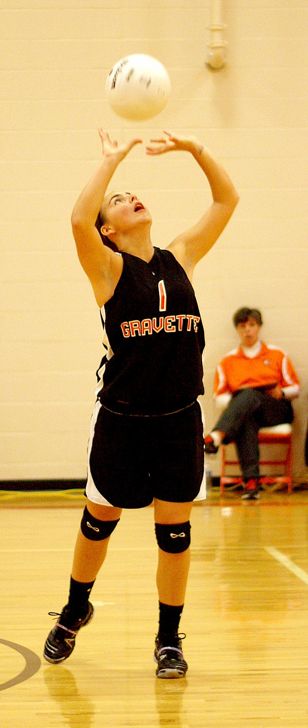 Gravette senior Shelby Frey sets the ball in tournament play at Gravette. Frey and Monica White earned allstate honors.