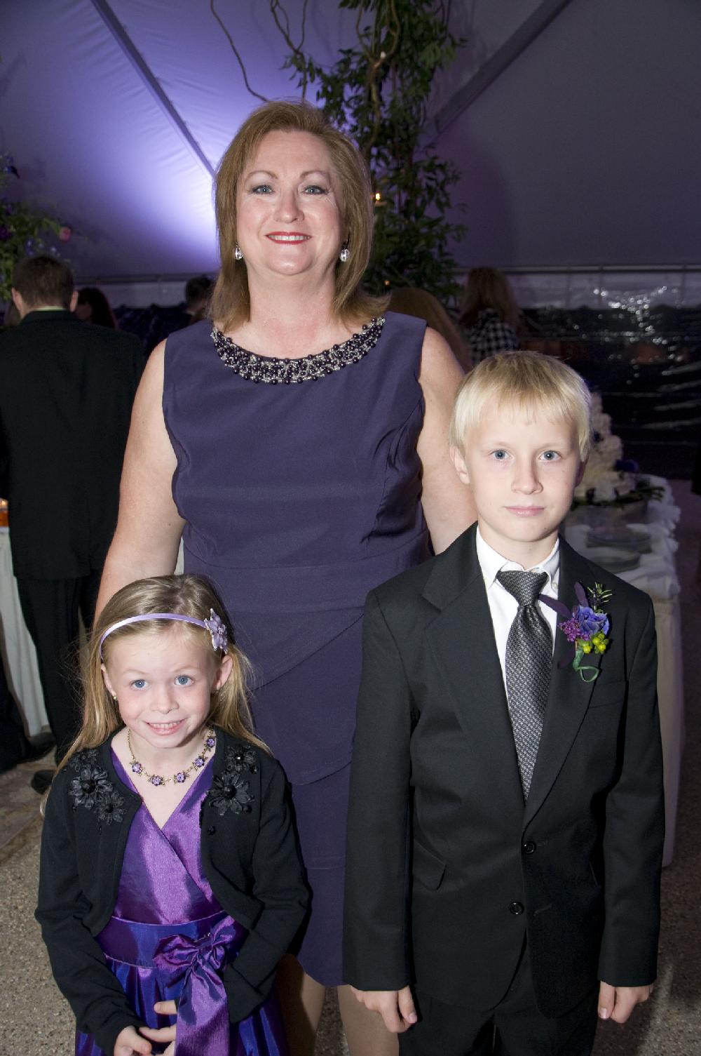 Arkansas Democrat-Gazette/CARY JENKINS
 

Mother of the groom, Paula Hancock, with her daughter Amber and son Christian