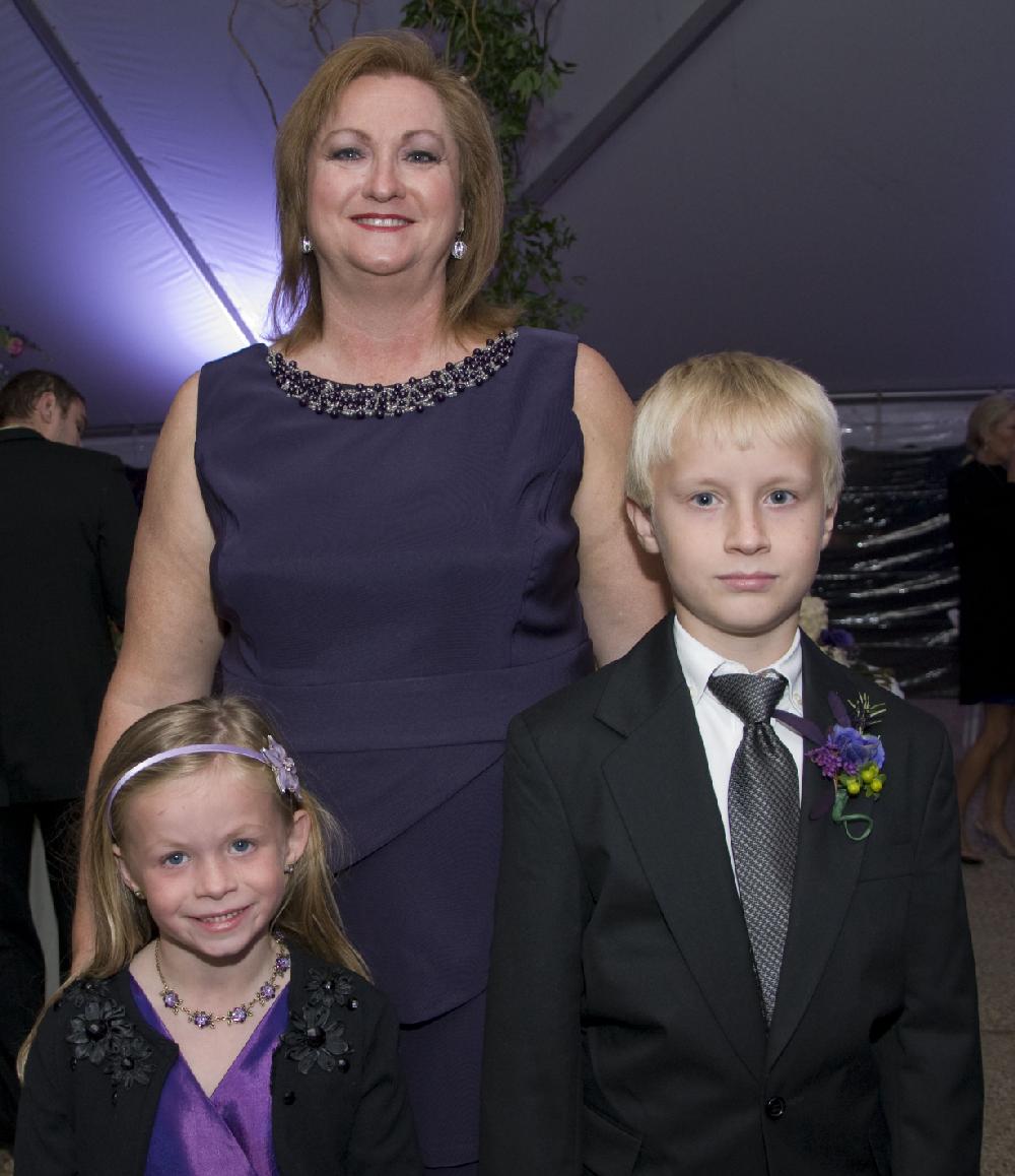 Arkansas Democrat-Gazette/CARY JENKINS
 

Mother of the groom, Paula Hancock, with her daughter Amber and son Christian