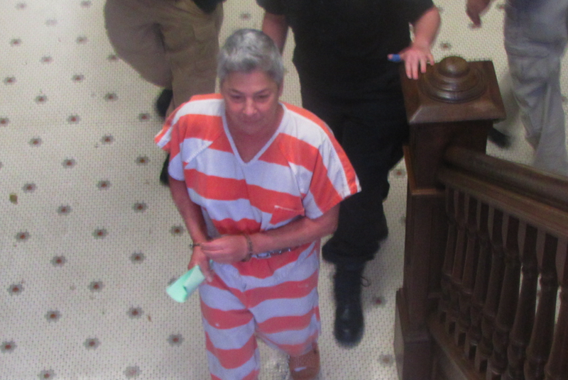 Marissa Wright is led from the Saline County Courthouse in November 2011.