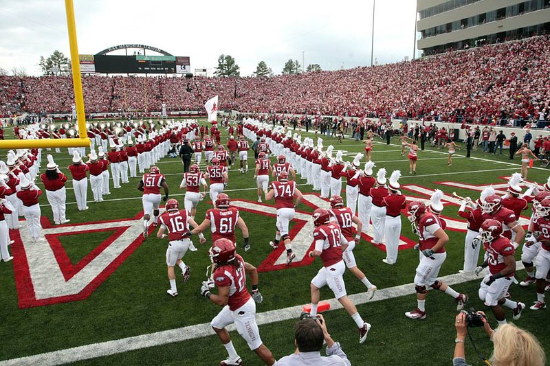  11/19/11
Arkansas Democrat-Gazette/STEPHEN B. THORNTON
Arkansass Razorbacks runs out onto the field at the start of  their  game Saturday against Mississippi State at War Memorial Stadium.