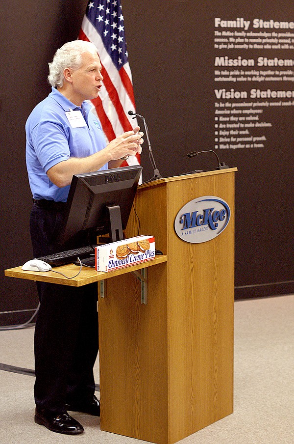 Tim Broughton, vice president, Gentry Operations, of McKee Foods, explains how the Gentry plant achieved a goal of sending no waste to the landfill during a special luncheon at the plant on Thursday.