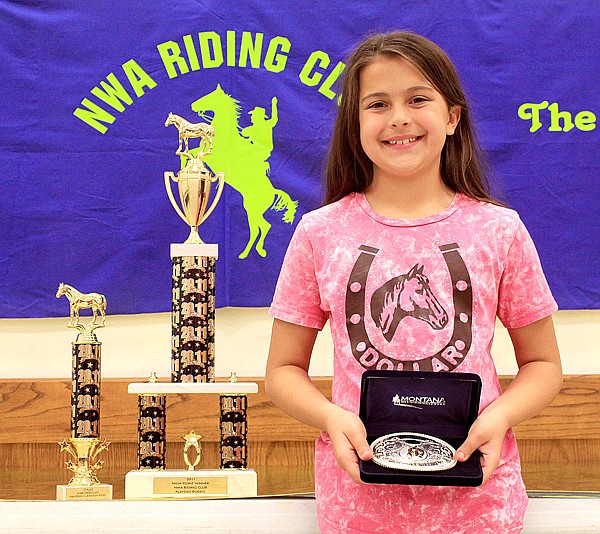 The NWA Riding Club had its end-of-the-year banquet at the Decatur Community Center, Saturday, Nov. 19. Falyn Cordeiro won first place in her age division, eight and under, for the second year in a row. She was also the overall high-point winner this year and received a trophy and belt buckle.