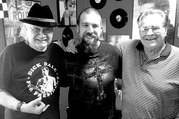 Dick Dale, left and Jack Reeves, right, with Steven Martinez, owner of the Hard Luck Cafe in Gravette.