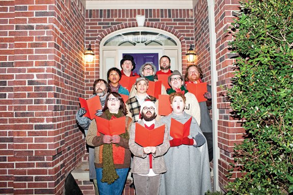 Members of Red Octopus practice caroling for the annual Pagans on Bobsleds sketch comedy show. On the front row, from left to right, Lesley Dancer, Brian Chambers and Sandy Baskin. Second row: Brooks Caruthers, Jason Willey and David Weatherly. Third row, Christi Seatts, Bart Haynie and  Josh Doering. Last but not least, Michael Goodbar and Aaron Bell.