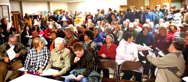 A standing room crowd of almost 200 people filled the Hiwasse Fire Station meeting room Monday night to hear Bella Vista Countil members discuss that city's proposed annexation of the Hiwasse Community. The hour-long meeting answered few questions acceptably to residents, who vocalized opposition and who will be affected if an election is held and voters approve the plan. The measure to finalize putting the question on a ballot requires two more readings, Bella Vista City Council members Doug Farner and J. D. Shrum told the group.
