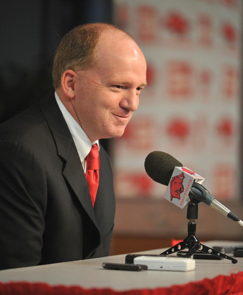 Arkansas Democrat-Gazette/MICHAEL WOODS --12/06/2011-- University of Arkansas coach Paul Petrino answers questions during a press conference Tuesday afternoon at the University of Arkansas after the official announcement of his return to the Arkansas coaching staff as the offensive coordinator and quarterbacks coach for the Razorbacks.
