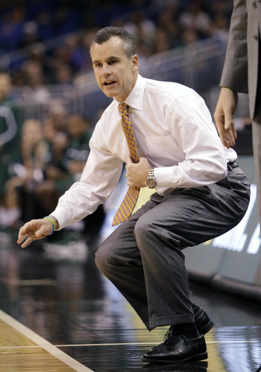 Florida coach Billy Donovan watches his team play Stetson during the first half of an NCAA college basketball game Monday, Nov. 28, 2011, in Orlando, Fla. Florida won 96-70, giving Donovan his 400th career win. (AP Photo/John Raoux)