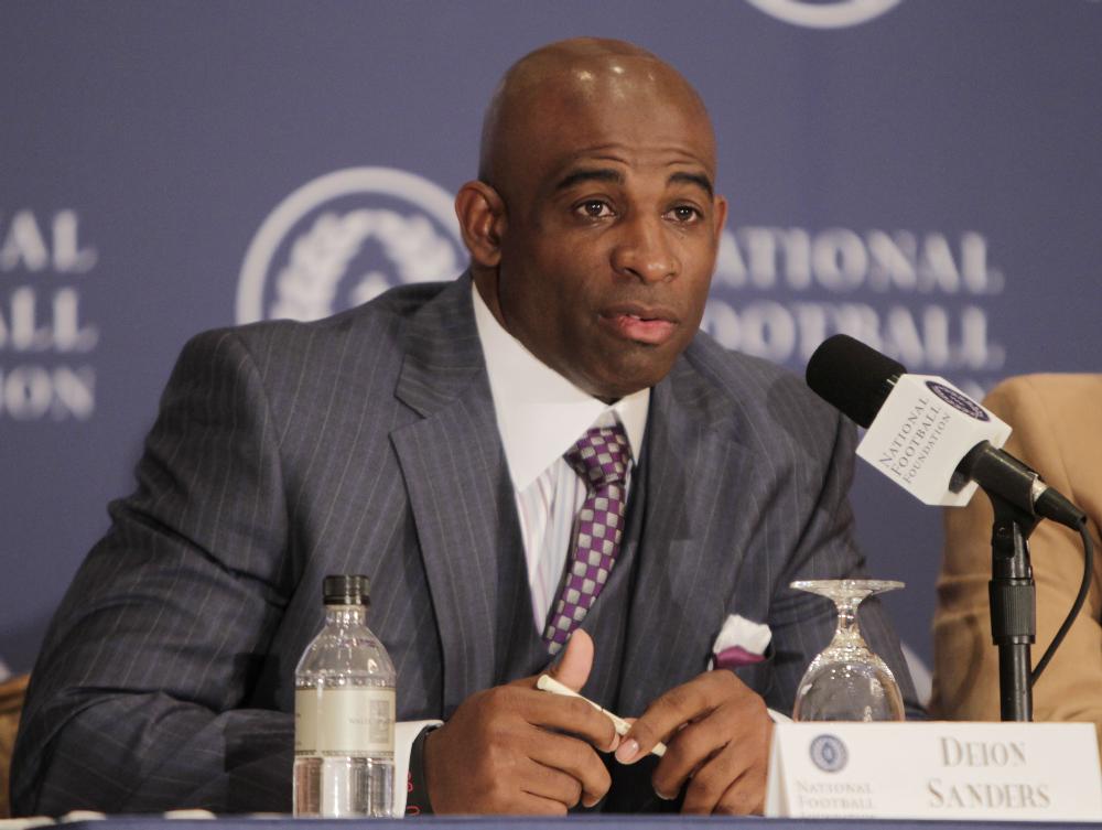 Former Florida State cornerback Deion Sanders speaks during a news conference in New York, Tuesday, Dec. 6, 2011. Sanders was one of 14 players and two coaches to be part of the 2011 College Football Hall of Fame class. (AP Photo/Seth Wenig)