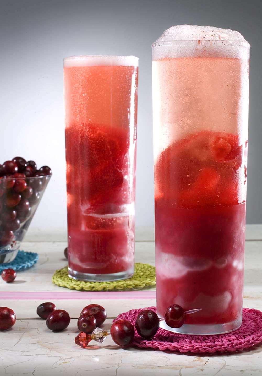 Cranberry season is here: Fresh is best so stock up on bags of the ruby-red jewels. Here homemade sorbet topped with Champagne or sparkling wine yields an adult float. (Tammy Ljungblad/Kansas City Star/MCT)