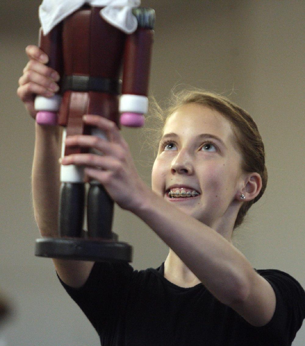 11/20/11
Arkansas Democrat-Gazette/STEPHEN B. THORNTON
Kathryn Latham, 14, thrusts the nutcraker into the air as she rehearses  Ballet Arkansas' The Nutcracker Sunday afternoon at Shuffles & Ballet II in Little Rock.
