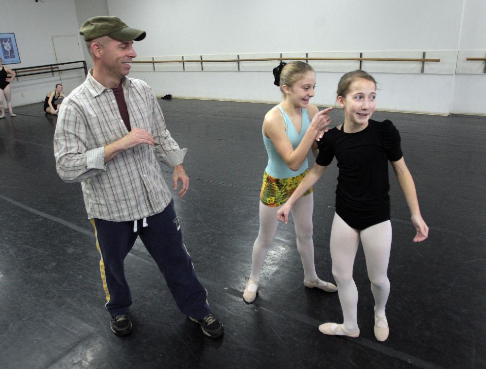 11/20/11
Arkansas Democrat-Gazette/STEPHEN B. THORNTON
Stephen Stone, left, who plays the role of Herr Drosselmeyer, left, jokes around with Lauren-Frances Wood, 12, center and Kathryn Latham, 14, right, during rehersal for  Ballet Arkansas' The Nutcracker Sunday afternoon at Shuffles & Ballet II in Little Rock. The girls will alternate playing the role of Clara in the ballet.