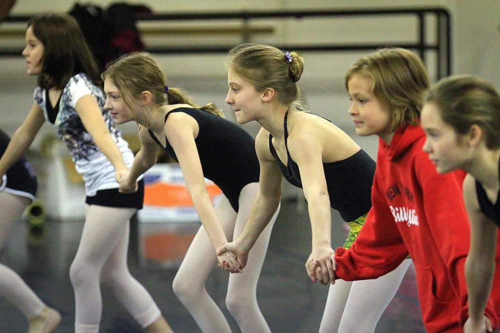 11/20/11
Arkansas Democrat-Gazette/STEPHEN B. THORNTON
Lauren-Frances Wood, 12, center, dances in a line of girls as they rehersal for  Ballet Arkansas' The Nutcracker Sunday afternoon at Shuffles & Ballet II in Little Rock. Wood and Kathryn Latham, 14,  will alternate playing the role of Clara in the ballet .