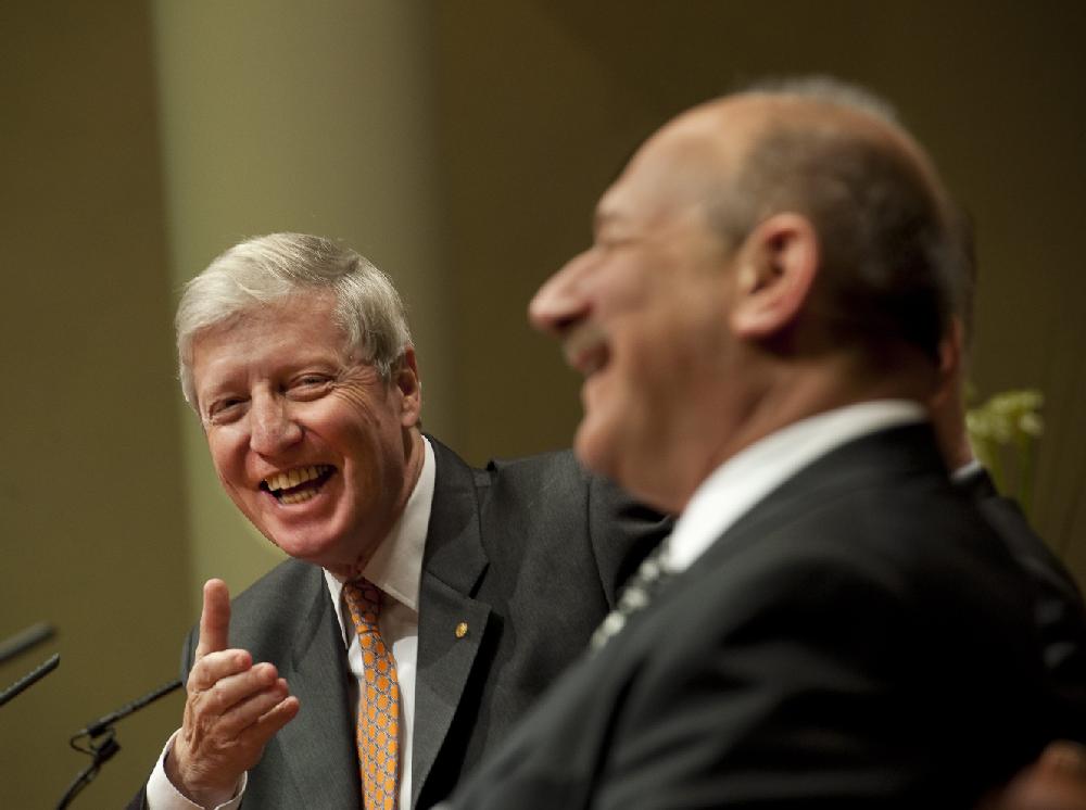 2011 Nobel medicine prize laureates Jules A. Hoffmann, left, Luxembourg-born Frenchman, and U.S. Bruce A. Beutler, right, share a laugh during their press conference at the Nobel Forum in Stockholm, Sweden, Tuesday Dec. 6 2011. Hoffmann is research director and member of the board of administrators of the National Center of Scientific Research (CNRS) in Strasbourg, France. Beutler works for The Scripps Research Institute, La Jolla, CA, USA, and University of Texas Southwestern Medical Center at Dallas, Dallas, TX, USA. They share the prize with Ralph M. Steinman who recently died. The Nobel Prize ceremonies will take place on upcoming Saturday. (AP photo/Scanpix Sweden/Jonas Ekstromer) SWEDEN OUT