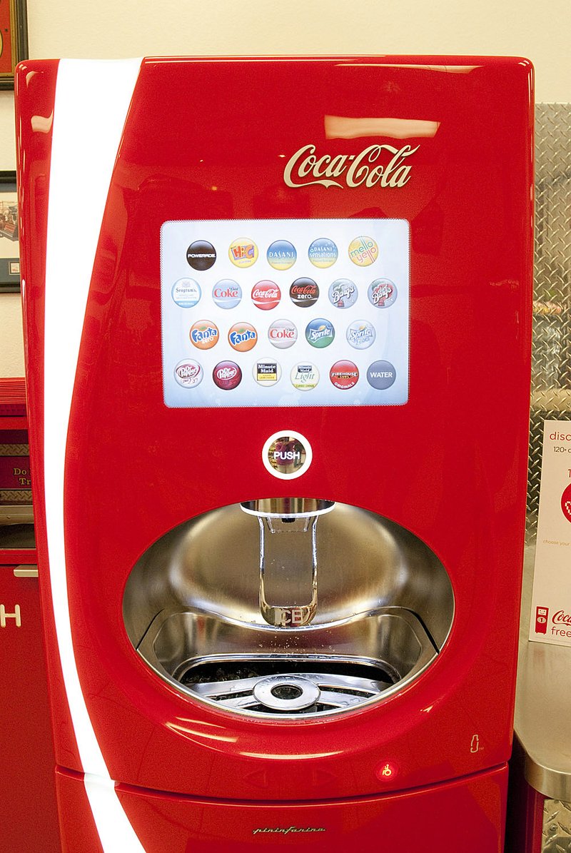 The new Coke Freestyle machine at Firehouse Subs in Little Rock allows users to customize drink combinations. 