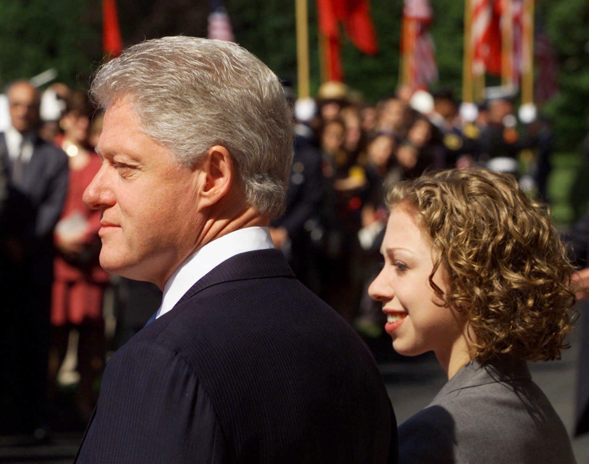 2000 | President Clinton stands with his daughter Chelsea as they wait for the arrival of His Majesty Mohammed VI, King of Morocco, for a State Arrival Ceremony on the South Grounds of the White House. With the first lady on the campaign trail in New York, Chelsea, home from college, took her mother's place at the formal welcoming ceremony. It is the first time that Chelsea, 20, has played the stand-in at a state arrival.