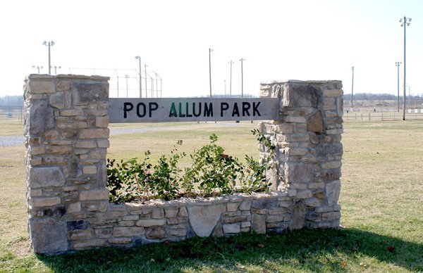 The entrance sign to Pop Allum Park, created by Gravette Eagle Scout Ty Graves.
