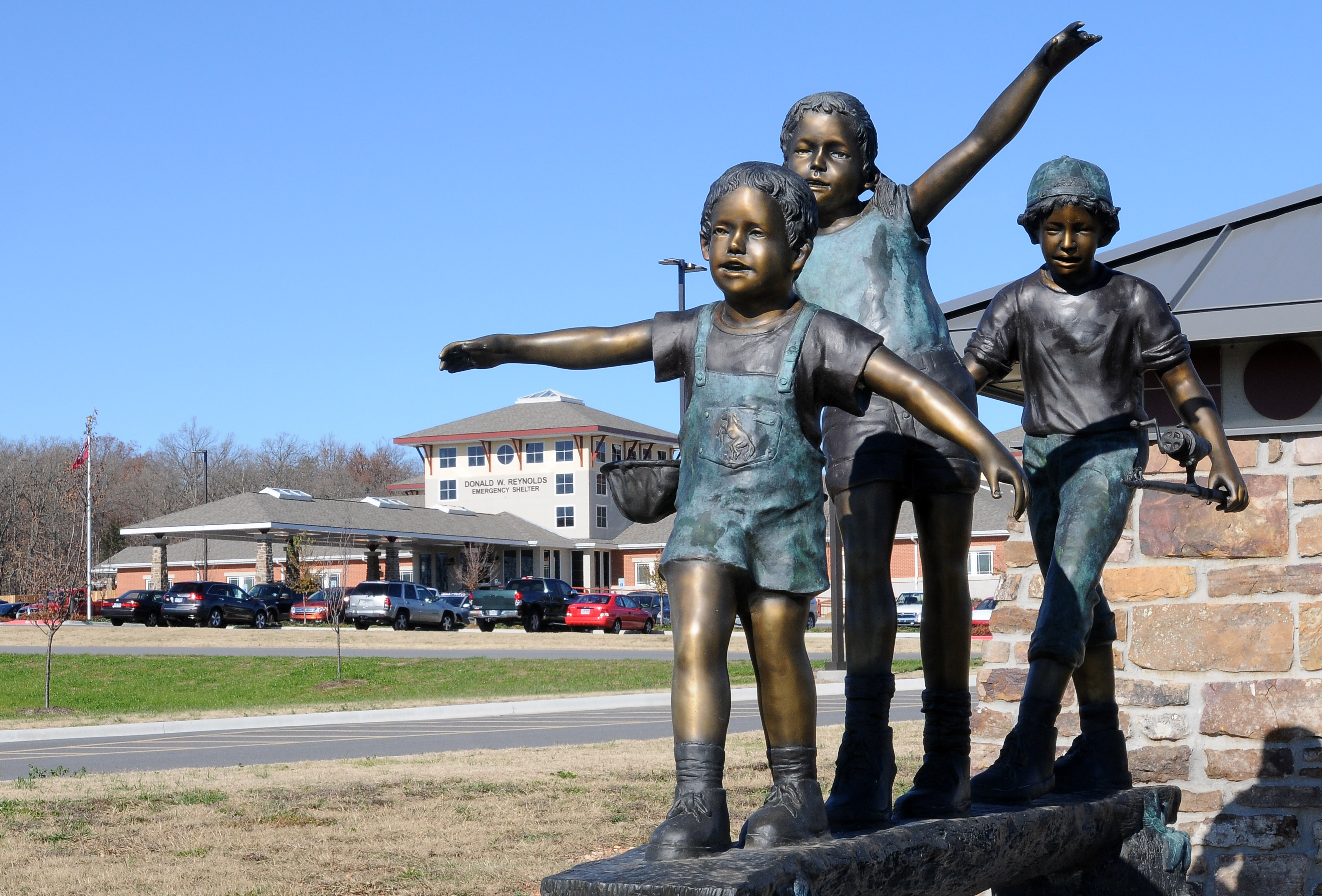 A sculpture in front of the Northwest Arkansas Children's Shelter.