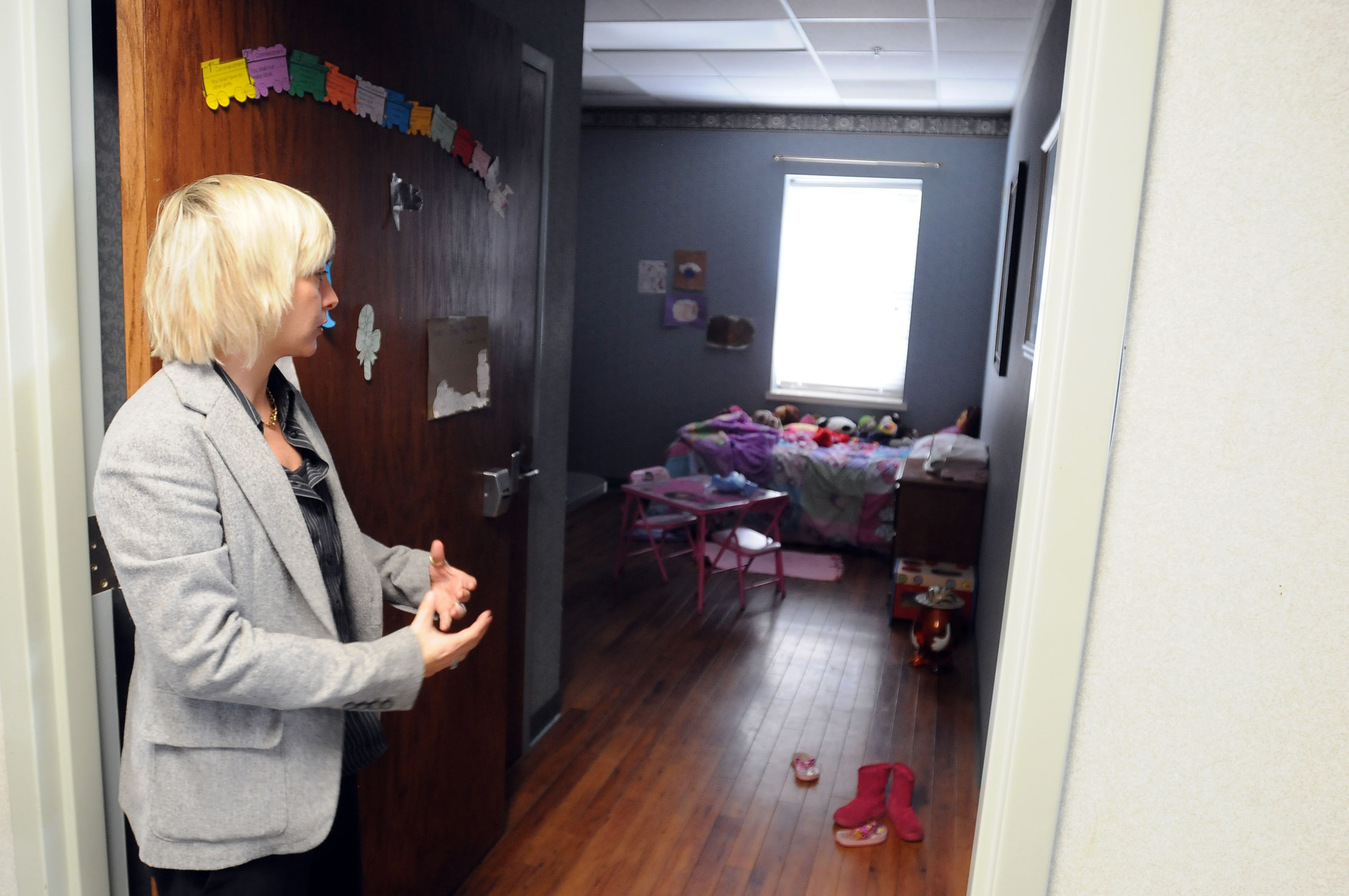 Saima Chauhan, with Decision Point Alcohol and Drug Treatment Services, shows the room of a child whose mother was in the rehabilitation program Thursday Dec. 8, 2011 in Bentonville.