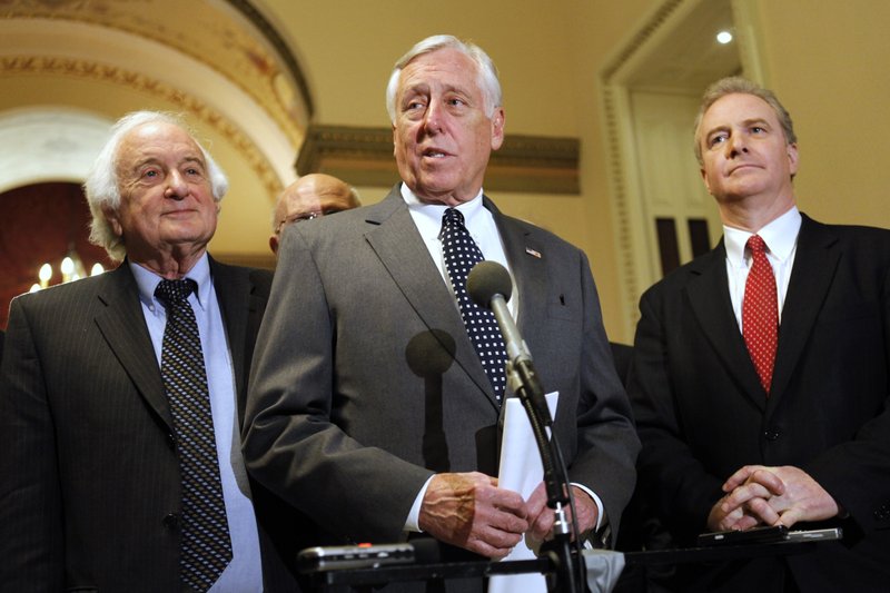 Ways and Means Committee Ranking Member Sander Levin, D-Mich., left, House Democratic Whip Steny H. Hoyer, D-Md., and Budget Committee Ranking Member Chris Van Hollen, D-Md., speak to the media about the payroll tax cut at the Capitol in Washington, on Friday, Dec. 23, 2011.