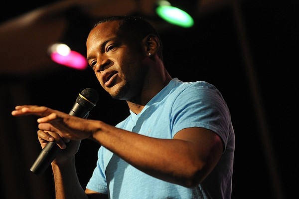 Northwest Arkansas-based comedian Anthony Waits performs earlier this year during a show by the Expendables of Comedy at the UARK Bowl in Fayetteville. He is one of five comics in the troupe, one of several such groups now operating in the area.
