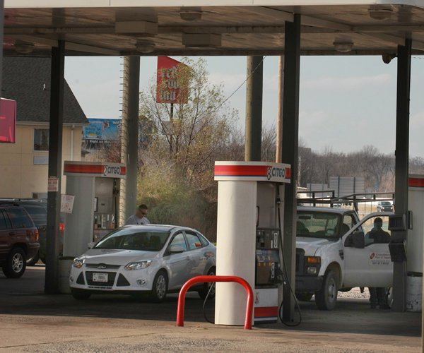 Motorists fuel up Friday at the Citgo station on Arkansas 161 at Interstate 40 in North Little Rock. 