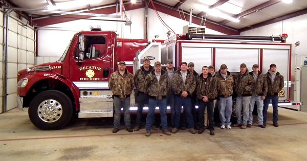 The Decatur Fire Department received a new pumper truck, purchased by Benton County. Firefighters posed with the truck at their Jan. 3 meeting.

