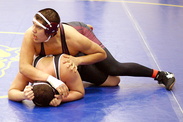 Gentry senior Ricky Hernandez clearly has the upper hand in his match for the third-place position in his weight class.