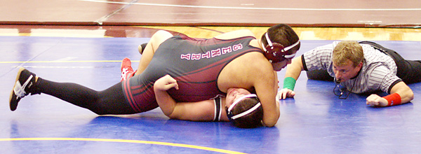 Gentry senior Ricky Hernandez waits for the call in his match for the third-place position in his weight class at the Pioneer Holiday Classic on Saturday in Gentry.