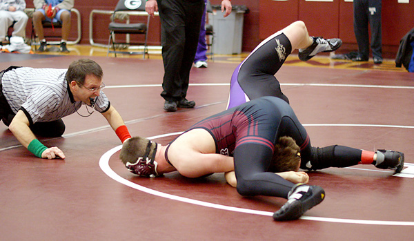 Gentry senior Kolby Rankin grapples with his opponent to obtain a fall in the championship round of the Holiday Classic held in Gentry on Saturday. Rankin took first in his weight class.