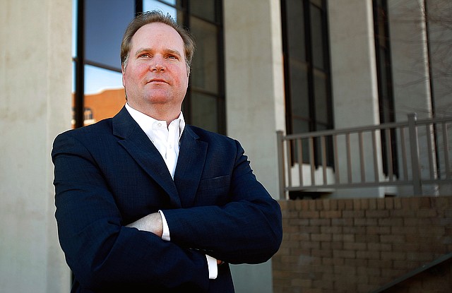 John David Lindsey stands outside Fayetteville’s John Paul Hammerschmidt Federal Building in January.